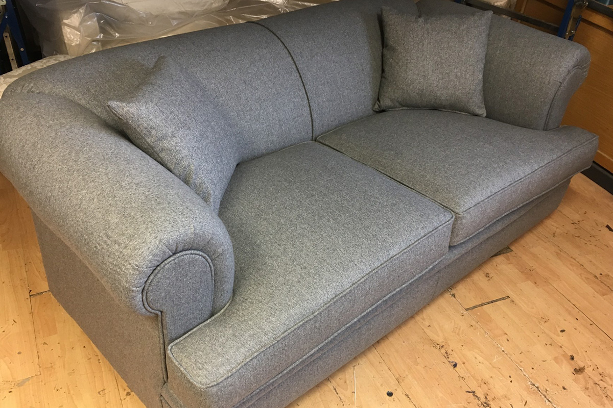 Grey upholstered sofa